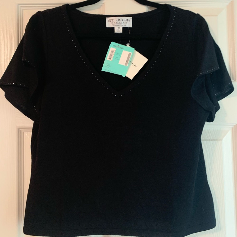 Women’s black sweater size 10